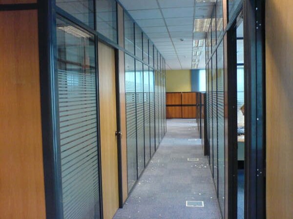 windows in office corridor with etched glass decor