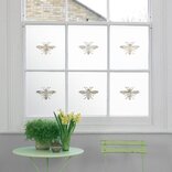 window with etch effect film with cut out bees