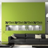 A green wall creatively decorated with signage vinyl, featuring intricate designs, inspiring quotes, or thematic elements, enhancing the aesthetic appeal and ambiance of the space.